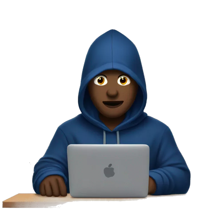 A man in a dark blue hoodie with a capelet on his head, his face not visible in the shadows, is sitting at a computer.